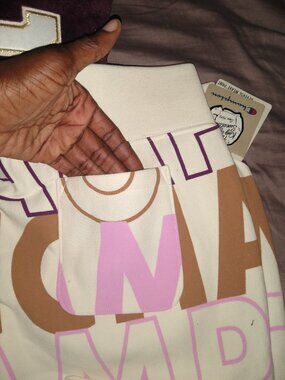 Women's winter champion sweater outfit.